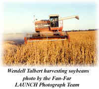 Wendell Talbert harvesting soybeans photo